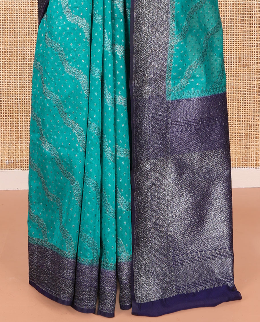 Blue Georgette Saree, Subtly Highlighted with Buttas and Diagonal Zig-Zag Stripes on Its Body, Complemented by a Contrast Gleaming Zari Textured Border, Pallu Adorned with Zari Designs, and Paired with a Contrast Blouse