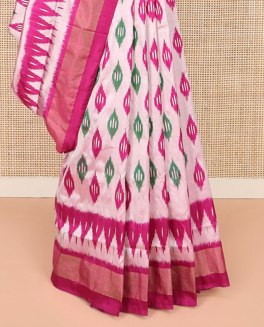 Pink Ikkat Silk Saree Highlighted with Diamond-Shaped Ikkat Buttas, Featuring a Contrast Ikkat Temple Border and a Pallu Showcasing an Ikkat-Textured Jaal Design, Paired with a Contrast Blouse