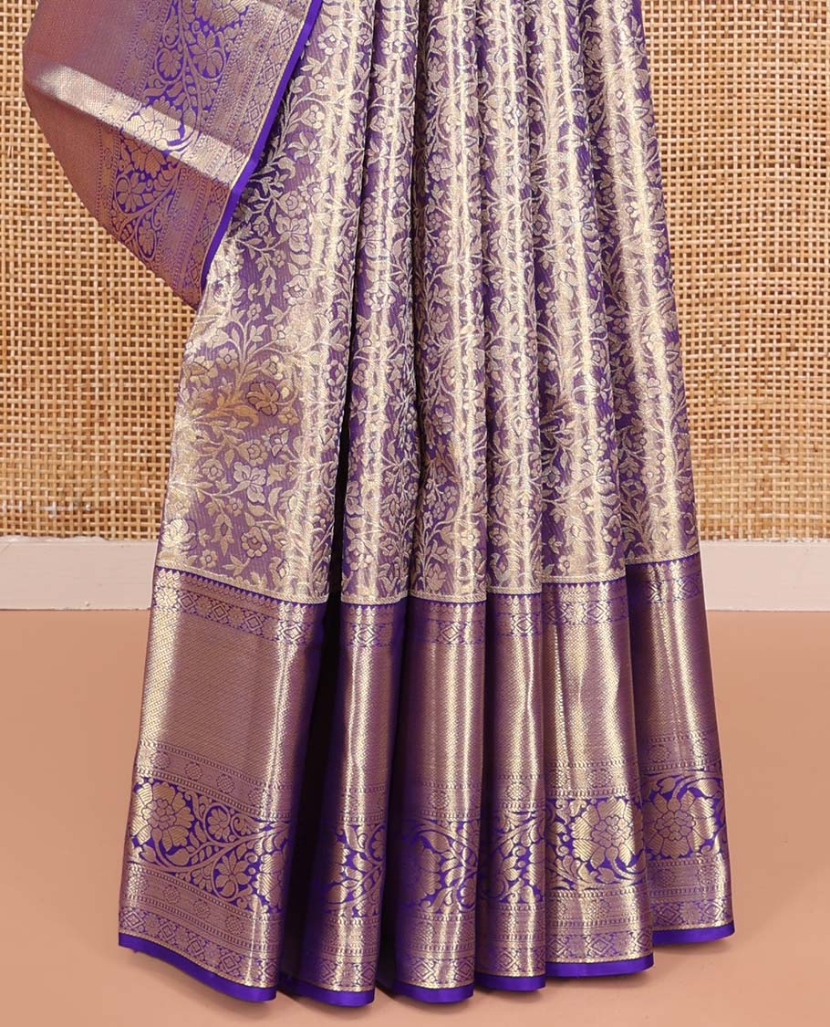 Blue Kanchipuram Tissue Silk Saree, Beautifully Bedecked with Floral Jacquard Designs on Its Body, Complemented by a Contrast Border of Thilakam, Kamalam, Diamond, and Kodi Visiry Designs, Intricately Designed Pallu, and Paired with Matching Blouse