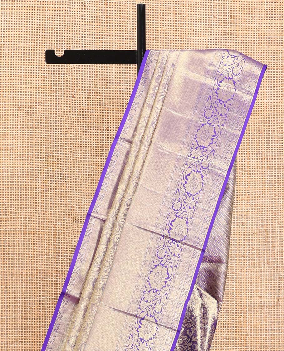 Blue Kanchipuram Tissue Silk Saree, Beautifully Bedecked with Floral Jacquard Designs on Its Body, Complemented by a Contrast Border of Thilakam, Kamalam, Diamond, and Kodi Visiry Designs, Intricately Designed Pallu, and Paired with Matching Blouse