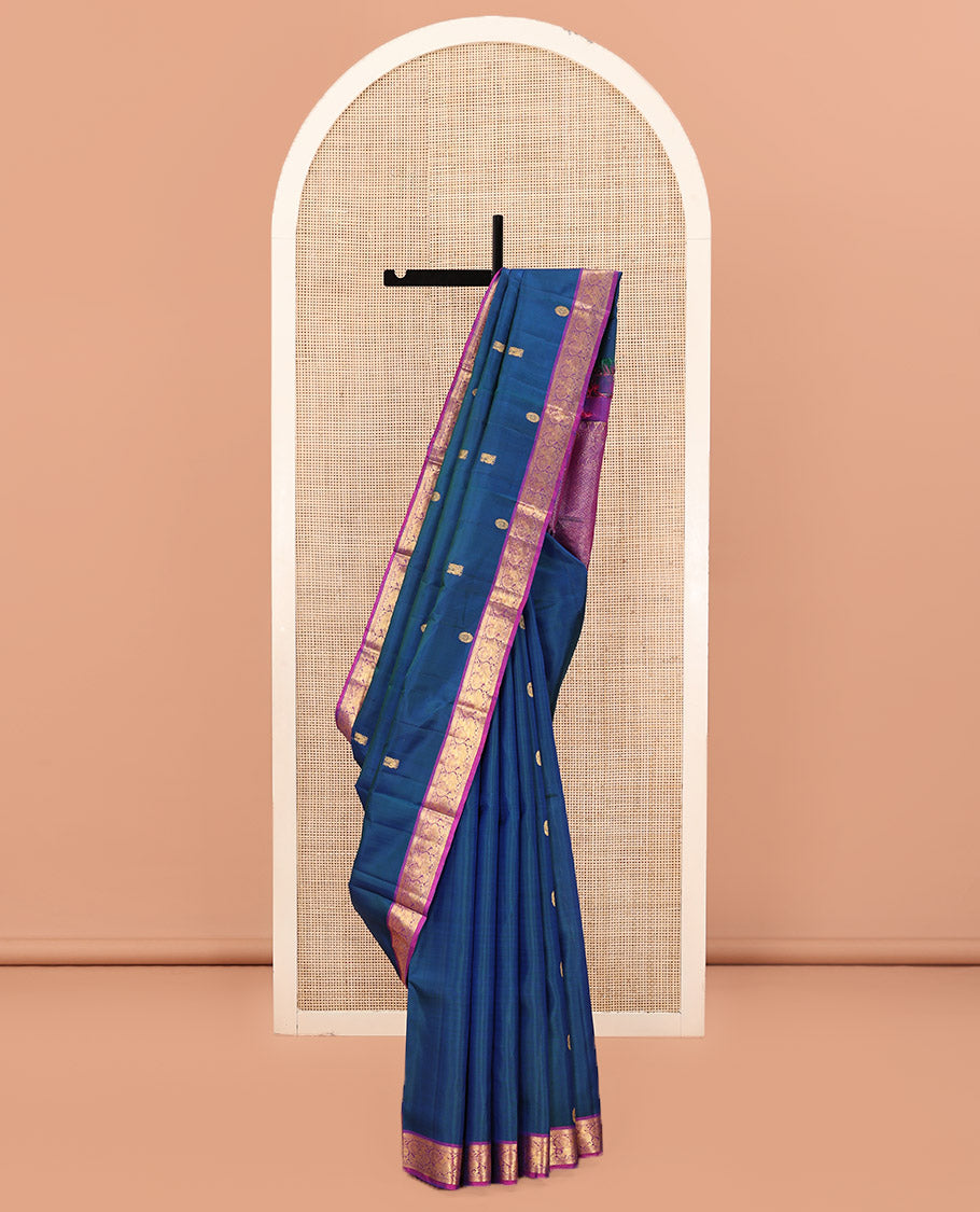 Blue Kanchipuram Silk Saree, Artfully Woven with Mayil Chakram Buttas All Over Its Body, Complemented by a Contrast Border of Muthu, Kathir, and Mayil Designs, Grand Jaal Pallu, and Paired with a Contrast Blouse