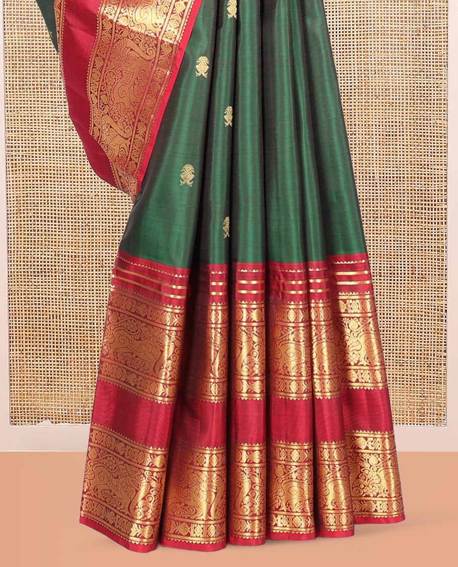 Green Kanchipuram Silk Saree, Adorned with Zari Buttas, Complemented by a Contrast Rettai Pettu Border of Rekku, Meen, and Yaali, Grand Jaal Pallu, and Contrast Blouse