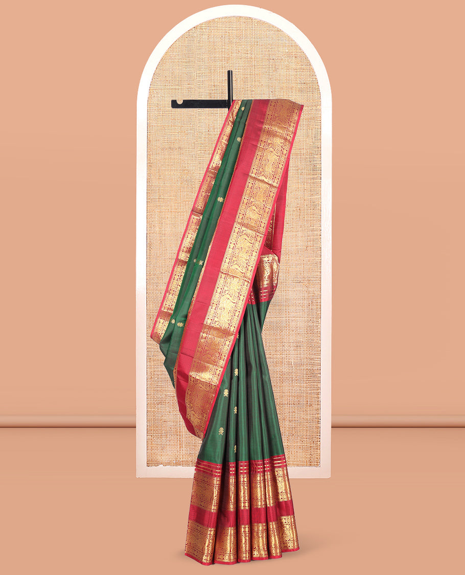 Green Kanchipuram Silk Saree, Adorned with Zari Buttas, Complemented by a Contrast Rettai Pettu Border of Rekku, Meen, and Yaali, Grand Jaal Pallu, and Contrast Blouse