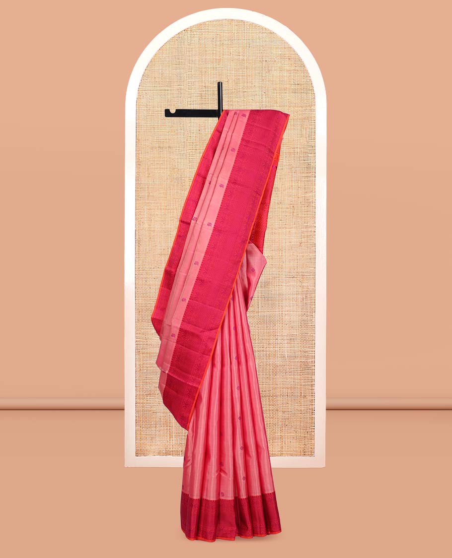 Pink Kanchipuram Silk Saree, Delicately Woven with Mayil-Chakram Buttas, a Contrast Border of Thilakam Mokku, Iruthalai Pakshi, and Kuyil Kann, Jaal Pallu, and a Contrast Blouse