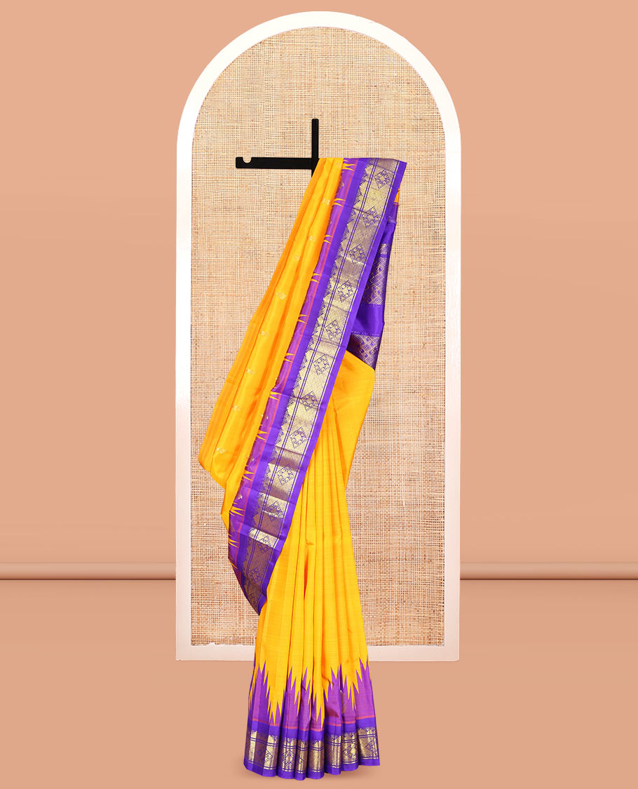 Yellow Kanchipuram Silk Saree, Adorned with Zari Buttas, Complemented by a Contrast One-Sided Thazampoo Rekku Traditional Zari Border, Grand Pallu, and No Blouse
