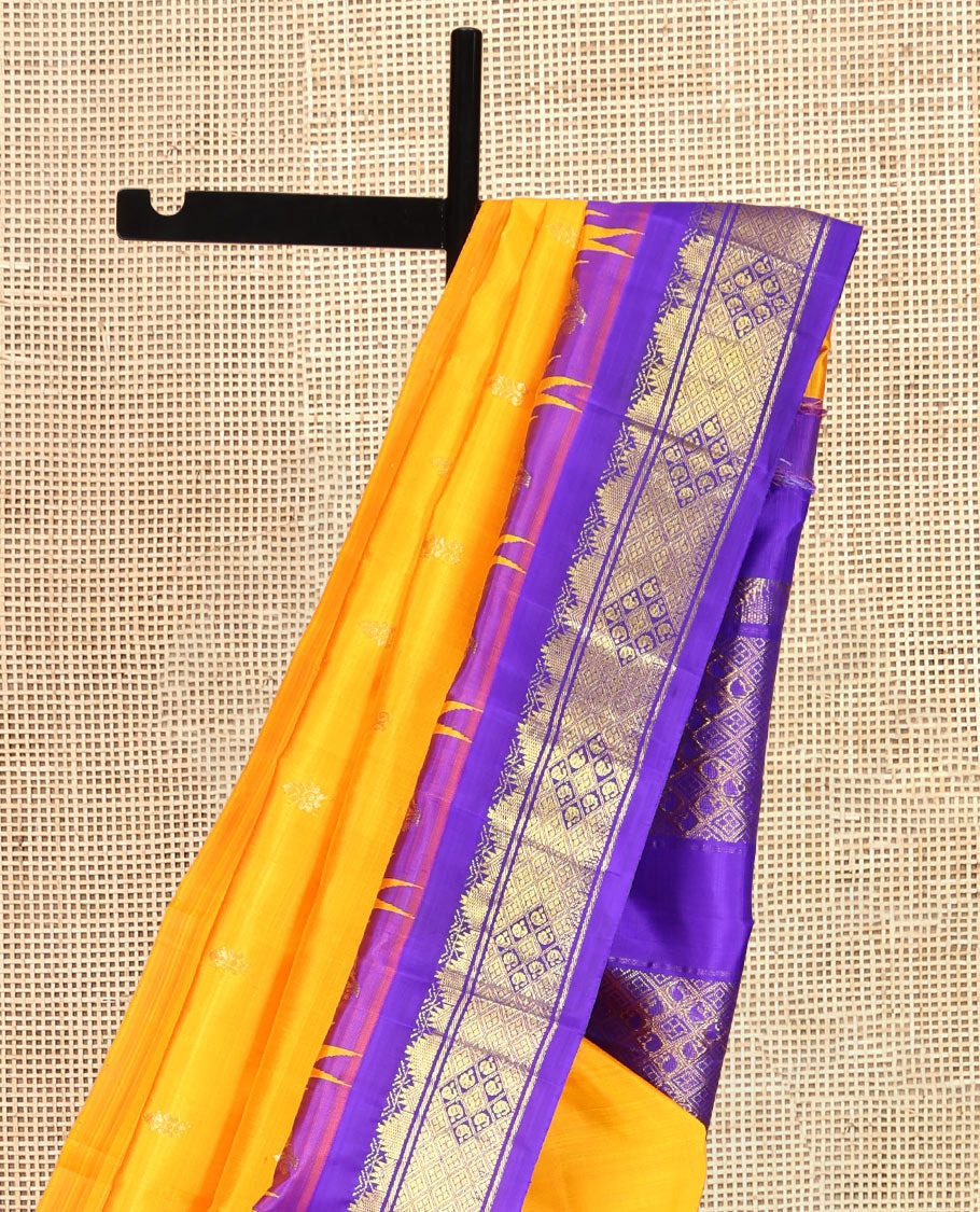 Yellow Kanchipuram Silk Saree, Adorned with Zari Buttas, Complemented by a Contrast One-Sided Thazampoo Rekku Traditional Zari Border, Grand Pallu, and No Blouse