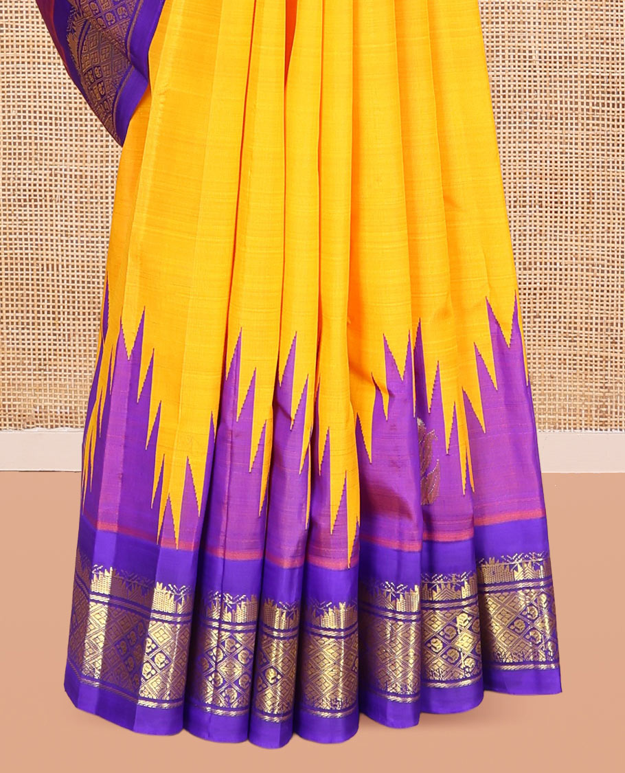 Yellow Kanchipuram Silk Saree, Adorned with Zari Buttas, Complemented by a Contrast One-Sided Thazampoo Rekku Traditional Zari Border, Grand Pallu, and No Blouse