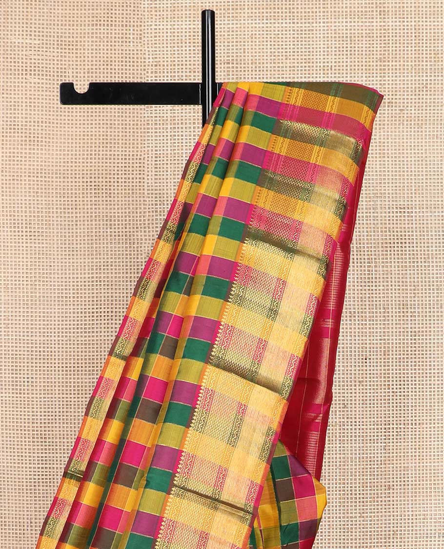 Multi-color palum pazhamum checked Kanchipuram silk saree, zari border of thilakam mokku, muthu, neli, and vanki designs, and zari-rich pallu
