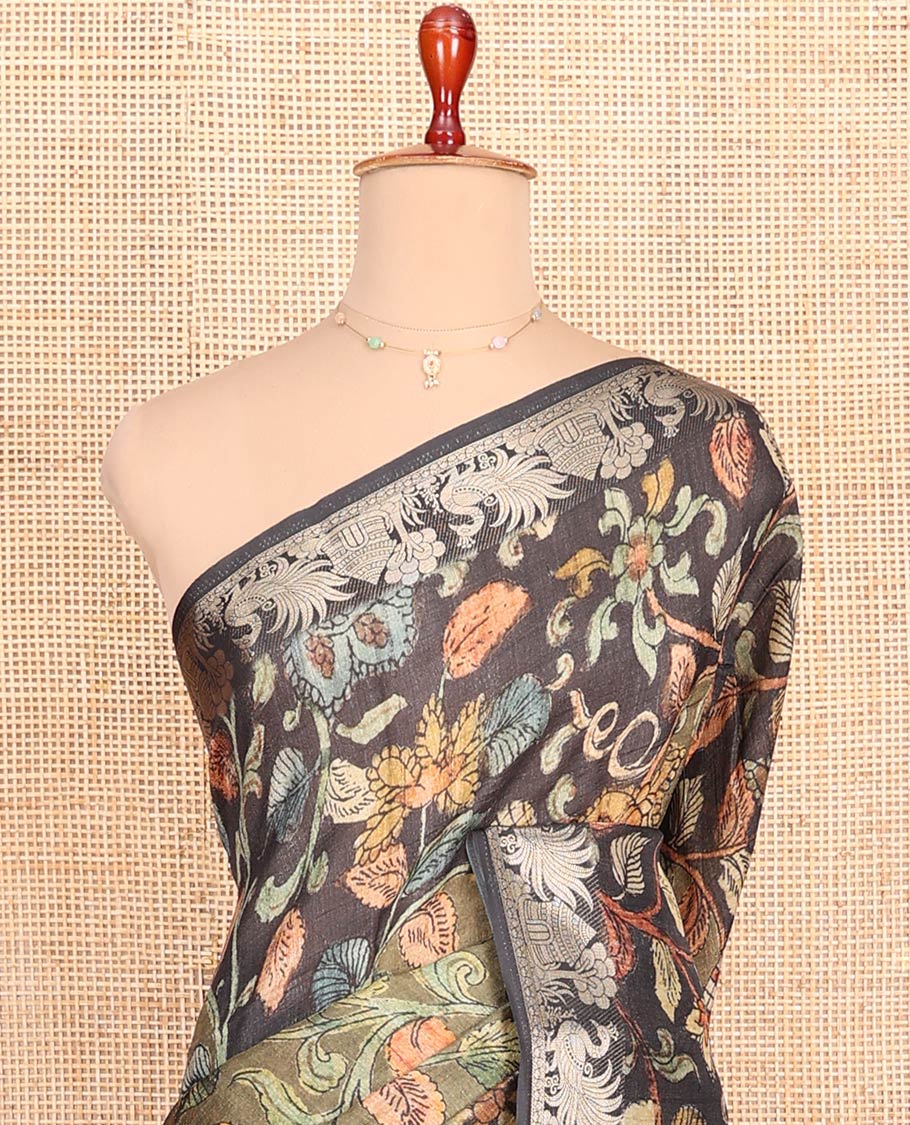 Green and Black Semi-Tussar Saree Adorned with Kalamkari-Style Floral Vine Print, Complemented by a Contrast Zari Border, Pallu of Floral Print, and Paired with a Contrast Blouse
