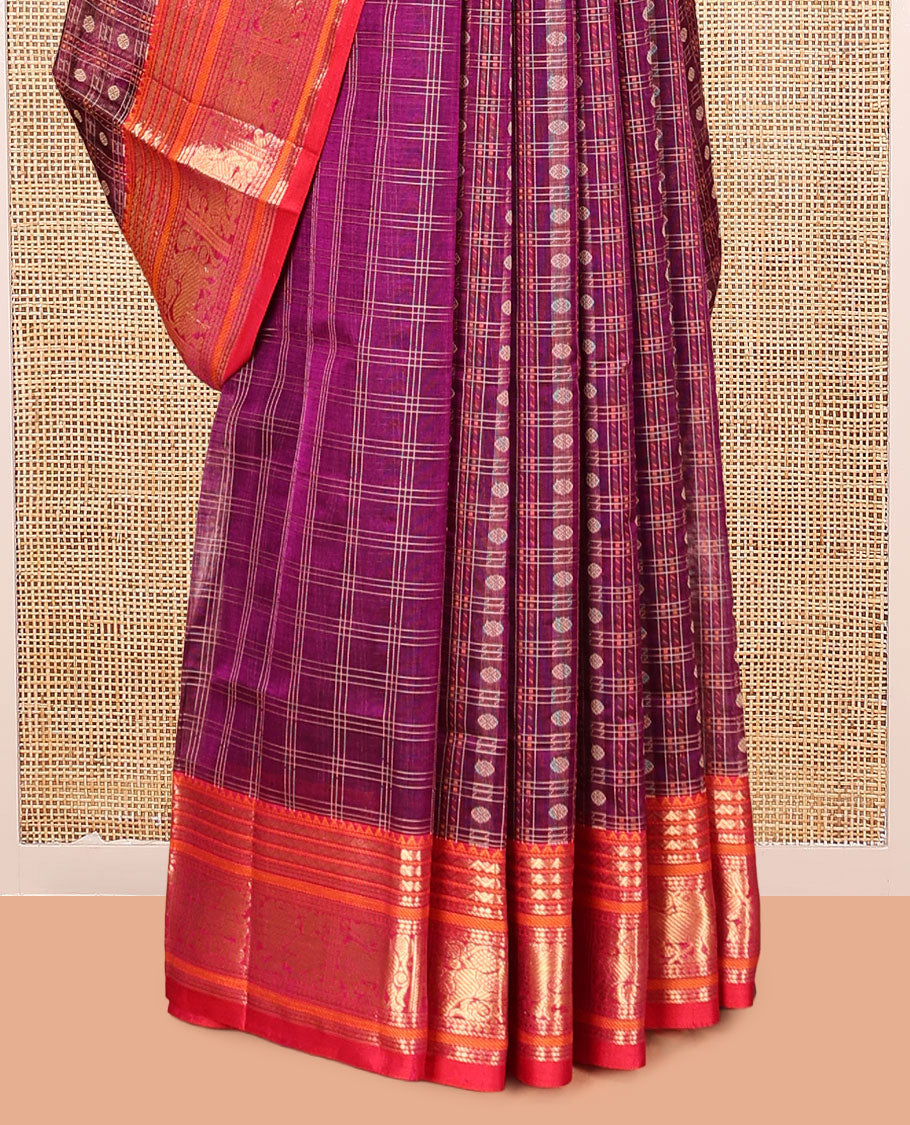 Purple Kuppadam Silk Saree, Adorned with Butta Enclosed Checks, a Contrast Traditional Peacock-Yaali Border, Pallu of Traditional Designs, and a Matching Blouse