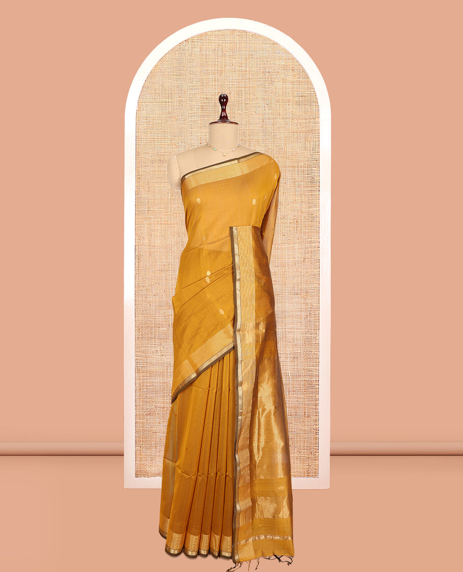 Mustard Maheshwari Cotton Saree, Adorned with Buttas, a Traditional Zari Border, Gleaming Zari Pallu, and a Matching Blouse