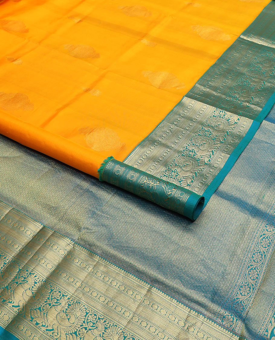 Orange zari buttas nine-yard silk saree, contrast border of thilakam mokku, Muthu, rudraksham, and mayil designs, and jaal pallu