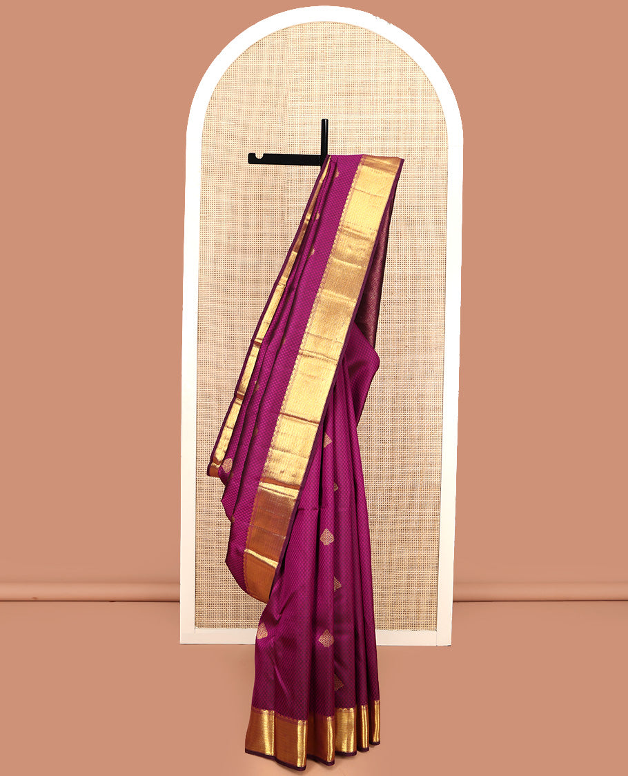 Wine Parampara Silk Saree, Enriched with Zari Buttas and Embossed Texture On Its Body, Highlighted by Zari Border of Thazampoo Rekku, Muthu, and Vanki Designs, Pallu Features Vanki Designs and Paired with a Matching Blouse
