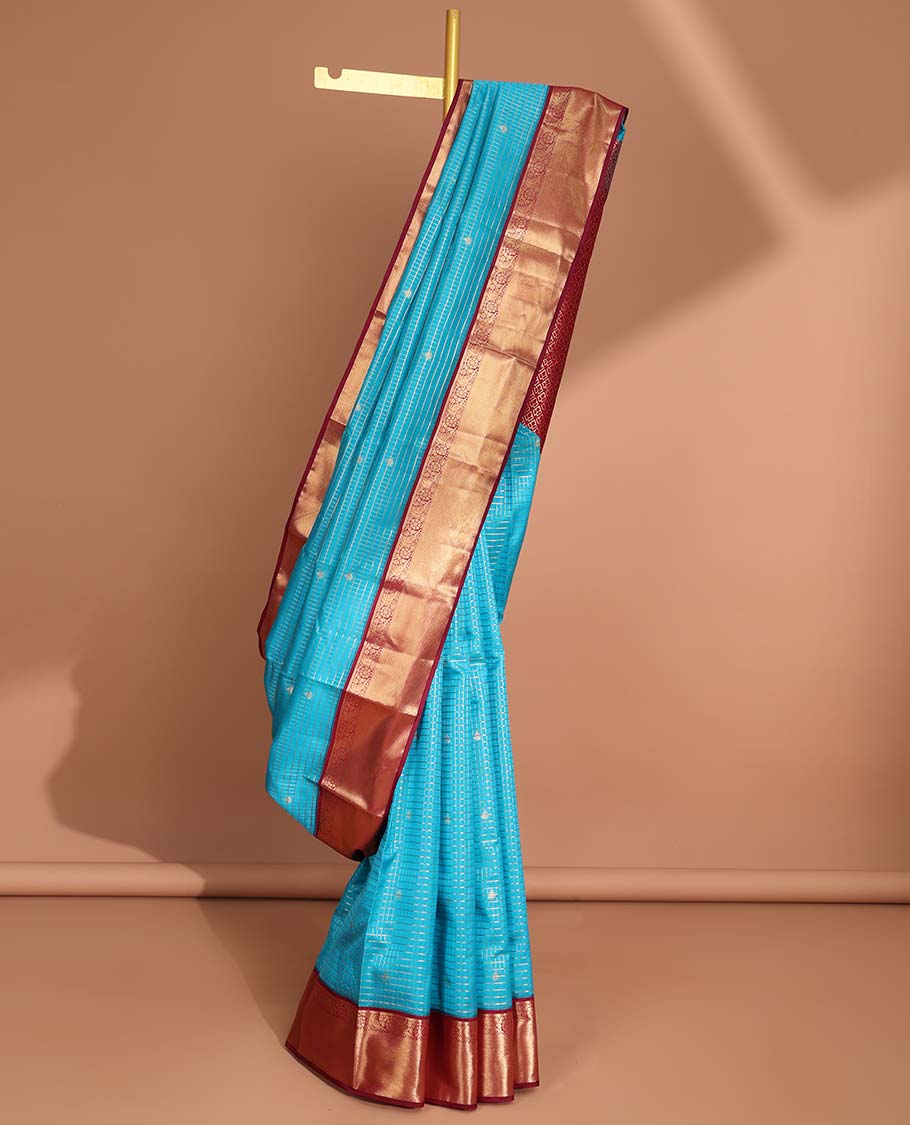 Blue checked, floral buttas vasundhara elite silk saree with contrast intricate zari design border & checked zari design pallu