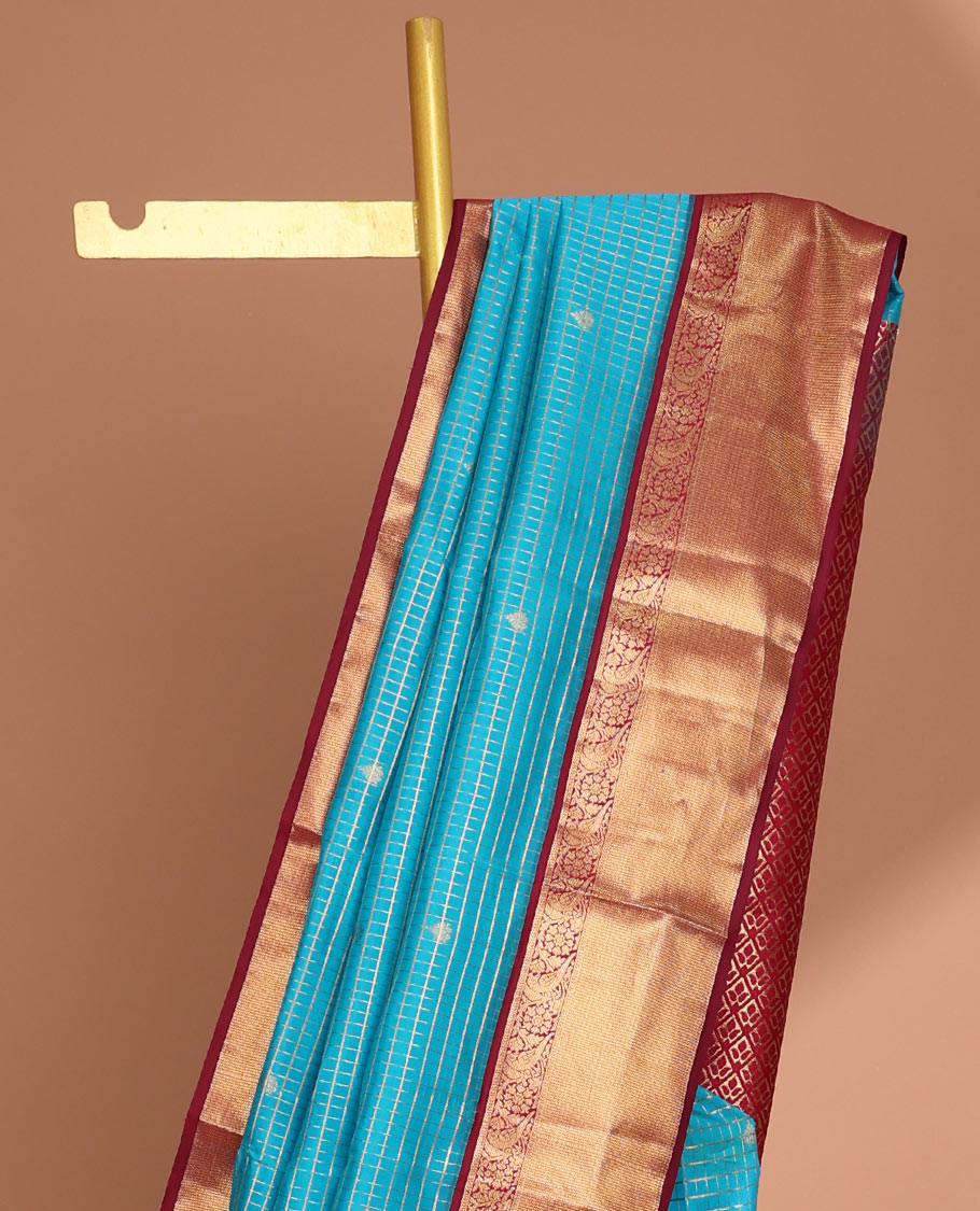 Blue checked, floral buttas vasundhara elite silk saree with contrast intricate zari design border & checked zari design pallu