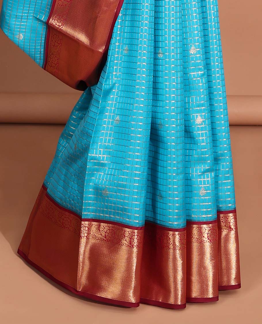 Blue checked, floral buttas vasundhara elite silk saree with contrast intricate zari design border & checked zari design pallu