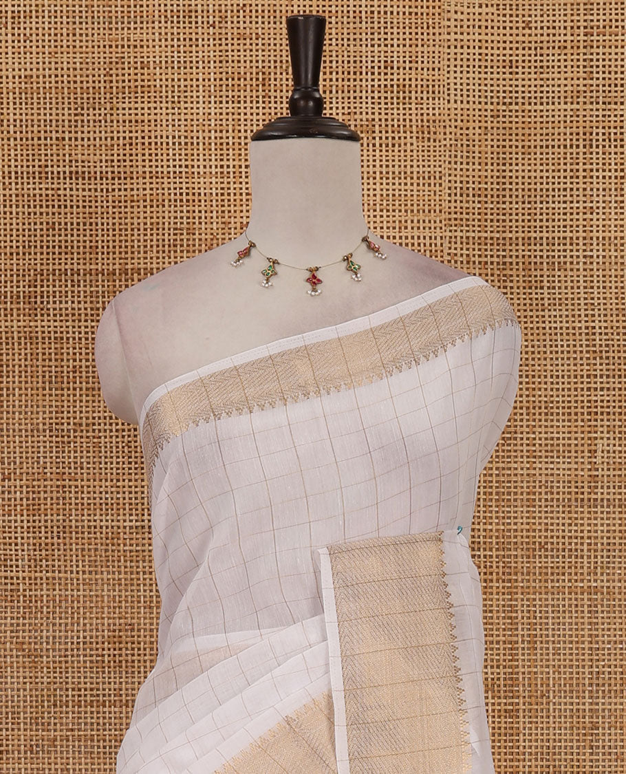 Cream checked Mercerised cotton saree, temple zari self-border, striped pallu & small striped blouse