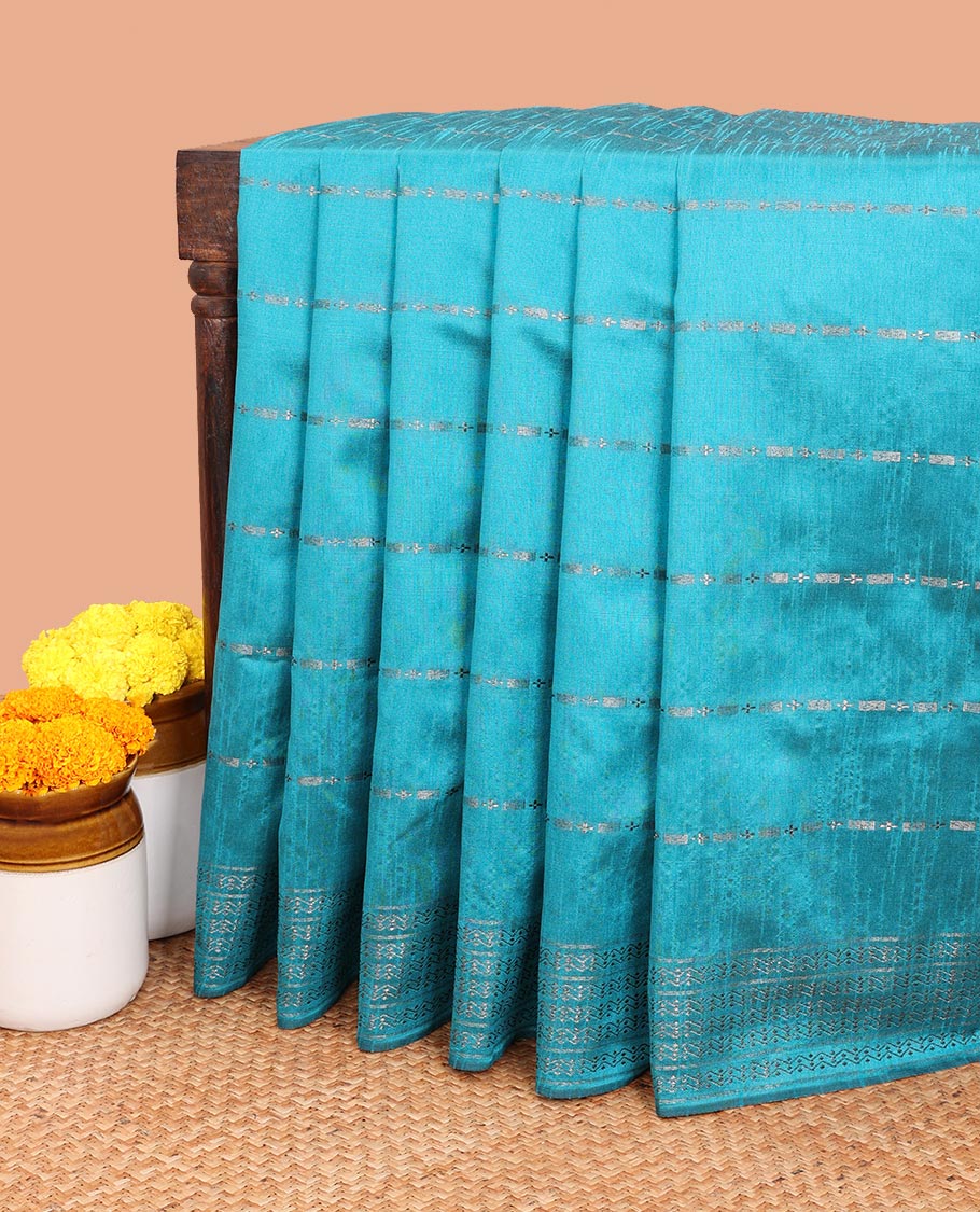 Rama green antique runaway design art jute silk saree with antique zari border & silver box design pallu along with plain blouse