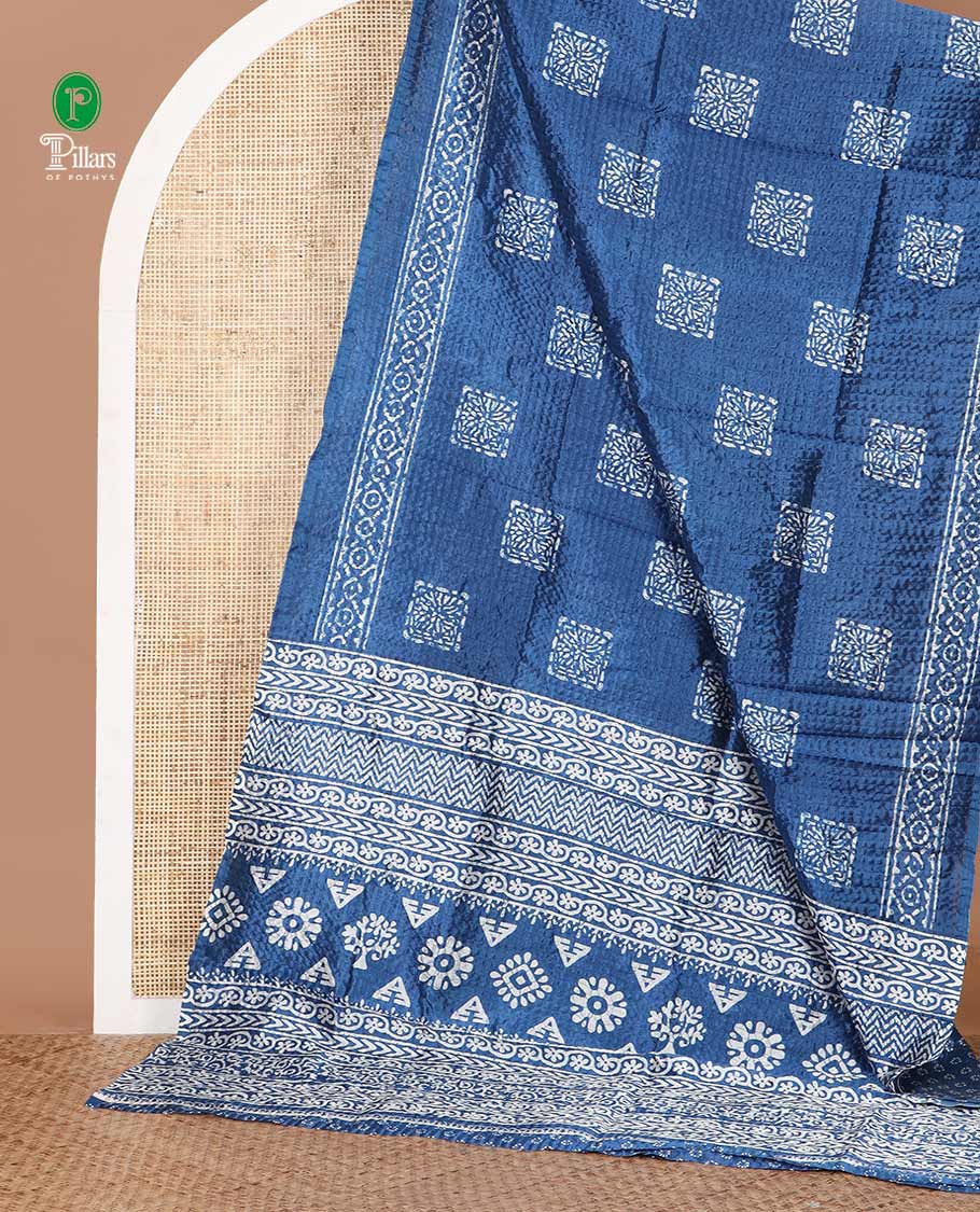 Blue batik buttas printed litchi crushed saree, batik-printed border, printed pallu & printed blouse