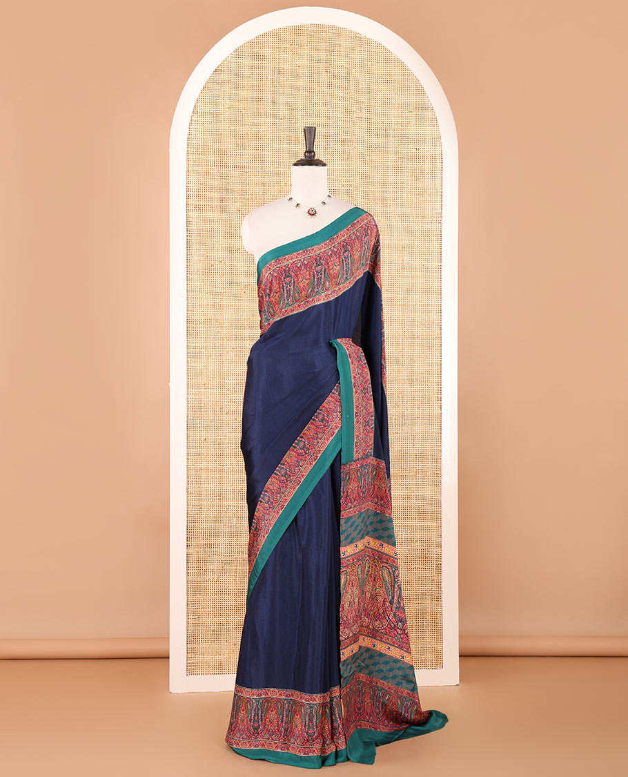 Navy blue full-plain crepe silk saree, contrast multi-color paisley printed border, paisley-geometric printed pallu & plain blouse