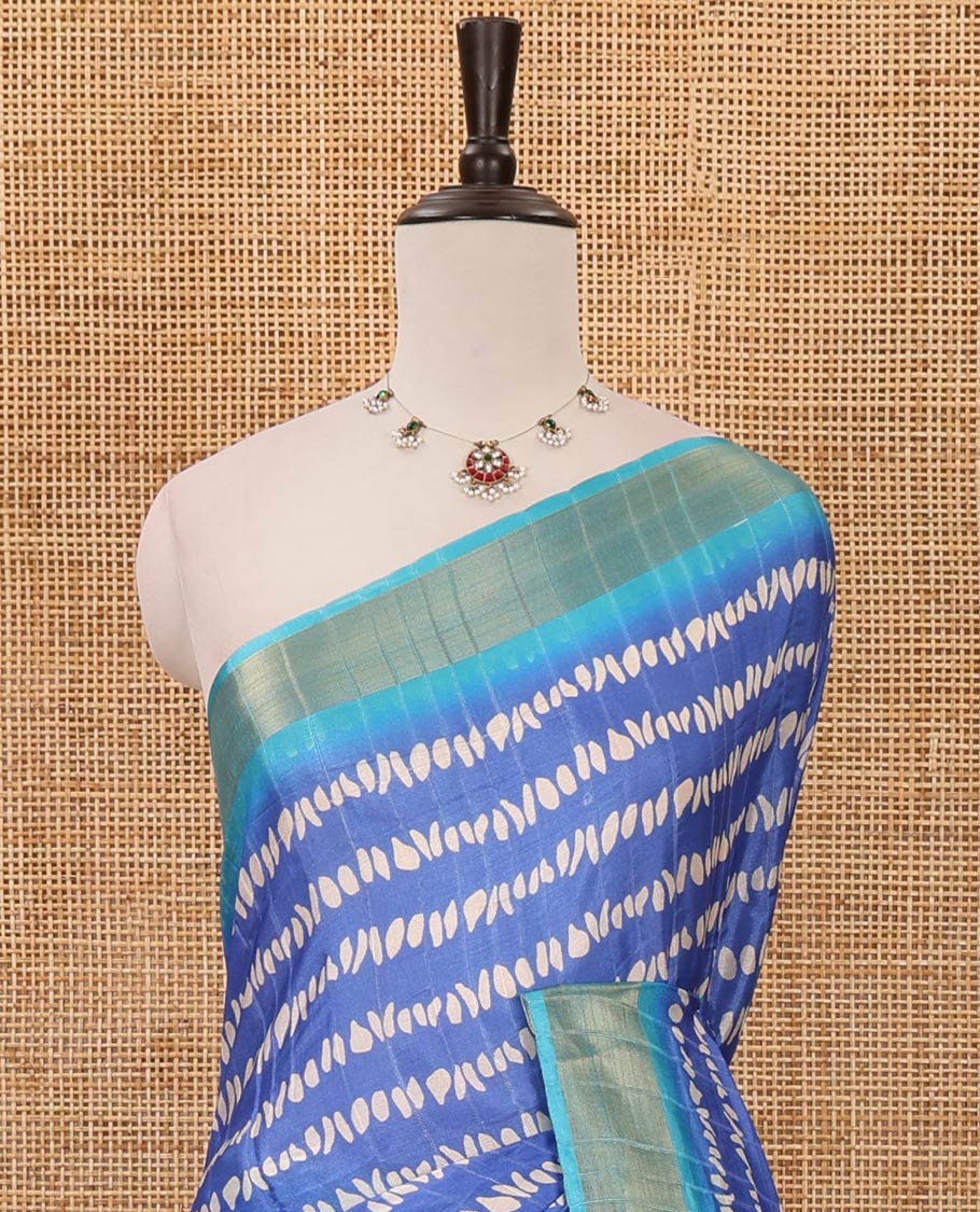 Blue uniquely printed soft tussar saree, contrast zari border, kalamkari floral vine printed pallu & kalamkari printed blouse