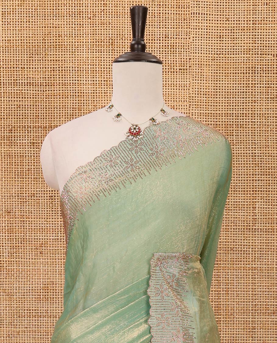 Pastle green plain fendy-chiffon saree, scallop Swarovski copper stone work border & contrast Swarovski copper stonework blouse