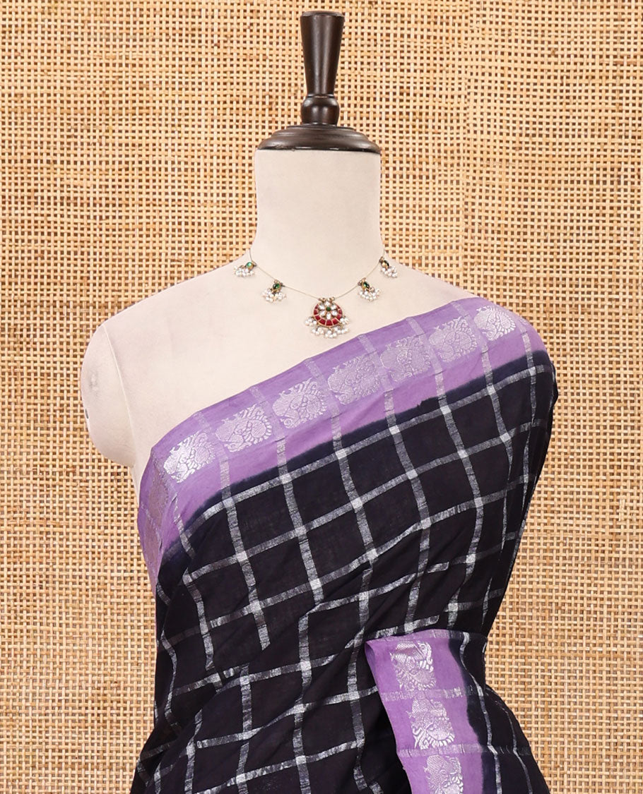 Deep purple zari checked sungudi cotton saree, contrast lavender border of zari peacock motifs & checked peacock motif lavender blouse