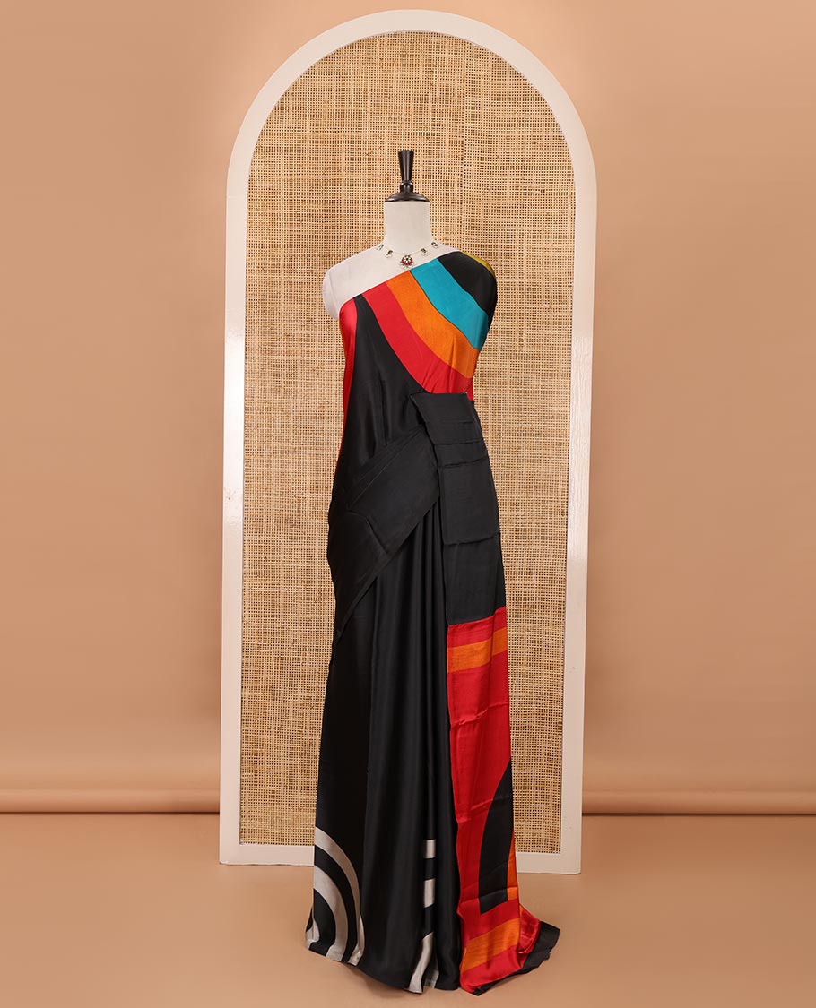 Borderless black-base kaleidoscopic-colored abstract printed satin crepe saree, rainbow-style printed pallu & matching plain blouse