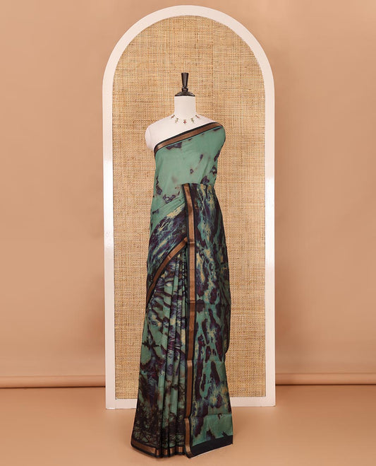 Sea blue shibori-style printed muslin saree, contrast zari piping border, self printed pallu & shibori-style printed blouse