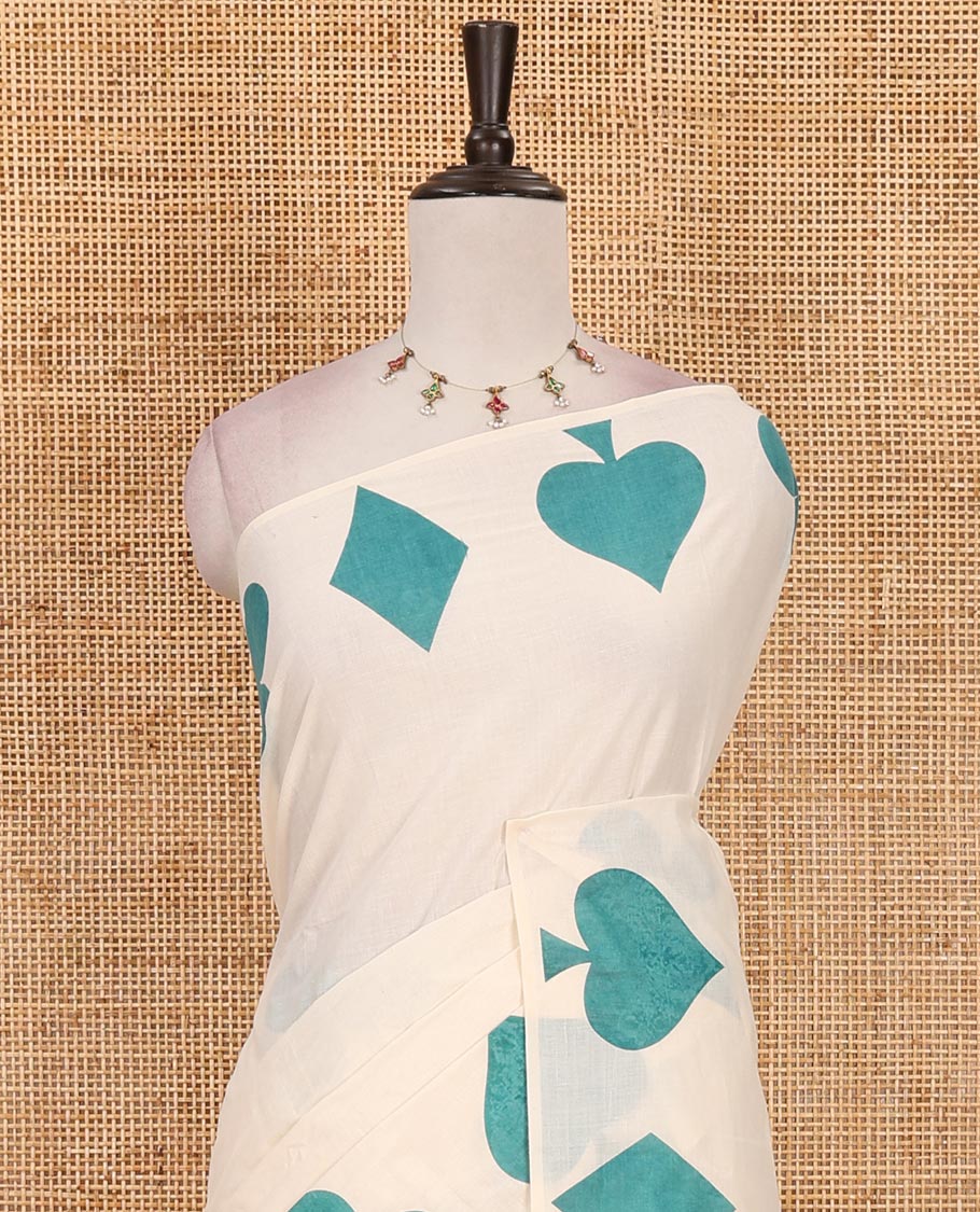 Cream-rama plain Kerala cotton saree, contrast color cards-theme printed border of Diamonds, Clubs, and Spades, leheriya-striped pallu, and plain blouse