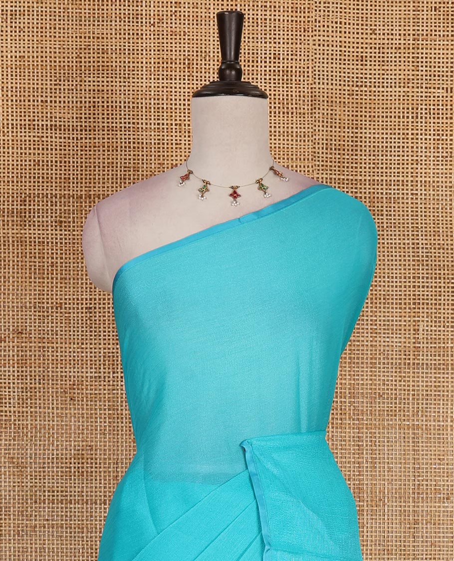 Borderless sky blue plain design viscose saree, flower motifs printed matching blouse