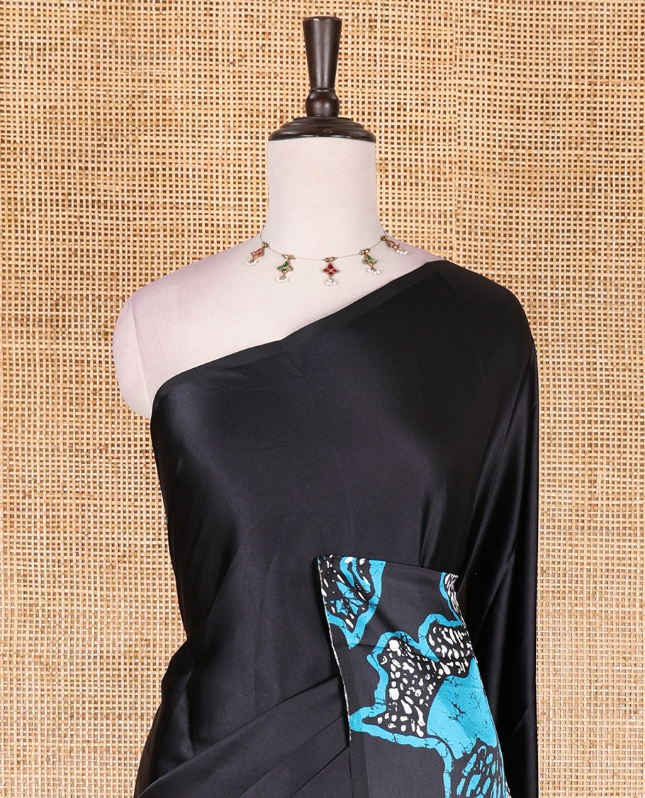 Borderless black-rama blue batik style abstract digital printed satin crepe saree with blouse of small buttas