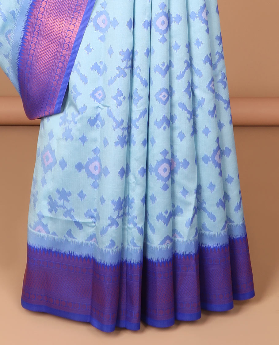 Sky blue ikkat design mulberry silk saree with contrast border & ikkat pallu along with self embosed butta blouse