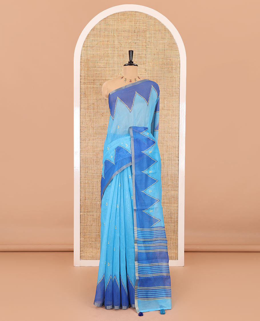 Sky blue small buttas printed Linen cotton saree, contrast double-sided temple border, striped pallu, and vertically striped blouse