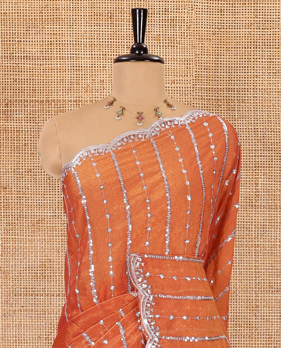 Orange vertical stripes embroidered shimmer chiffon saree, scallop embroidered border, embroidered pallu, and fancy embroidered matching blouse