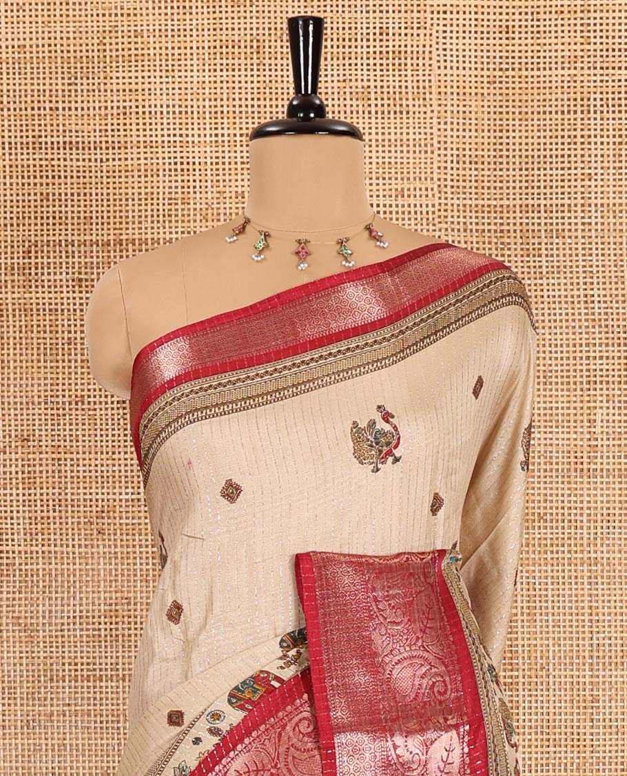 Chikku-maroon vertical striped, and animal motifs printed dola silk saree, contrast manga motifs zari border, animal motifs printed pallu, and a contrast printed blouse