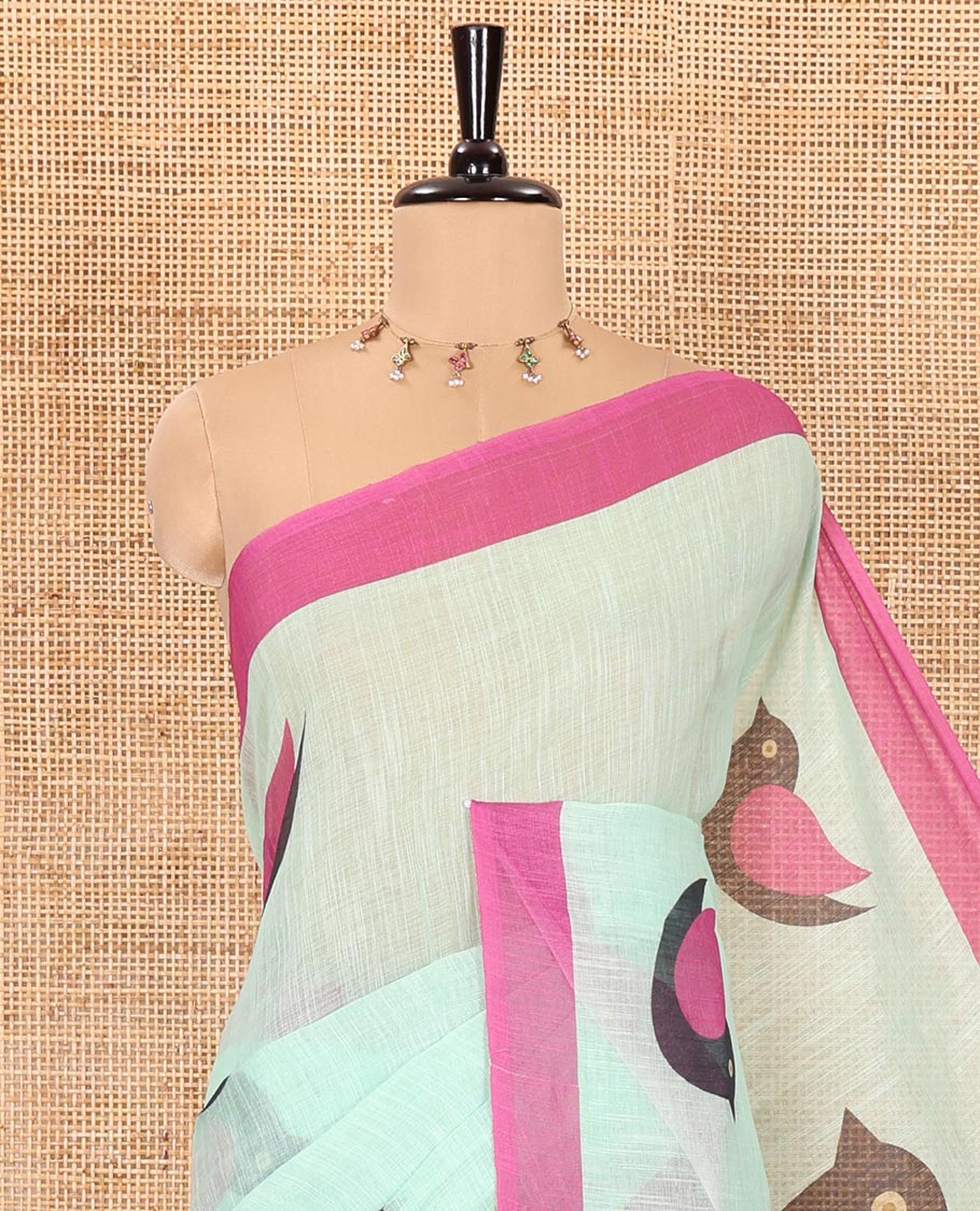 Pista green birds motifs linen cotton saree with contrast plain border , birds mofits pallu and leaf printed blouse