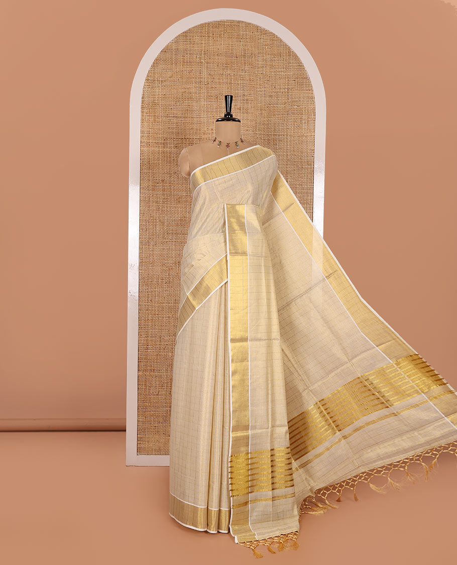 Gold Kerala Cotton Saree, Gleamed Up with Medium-Sized Checks All Over Its Body, Subtle Bavanji Border, Scintillating Zari Design Pallu, and Paired with a Matching Blouse