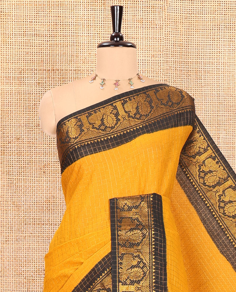Mustard Sungudi Cotton Saree, Subtly Sparkled with Checks on Its Body, Complemented by a Contrast Temple Border of Peacock Motifs, Pallu Steeped with Stripes, and Paired with a Contrast Blouse