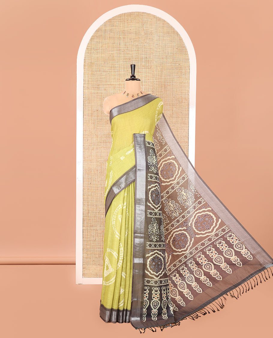 Green Linen Cotton Saree, Adorned with Shibori Printed on Its Body, Complemented by a Contrast Bavanji Zari Border, Handblock Printed Pallu, and Paired with a Contrast Blouse
