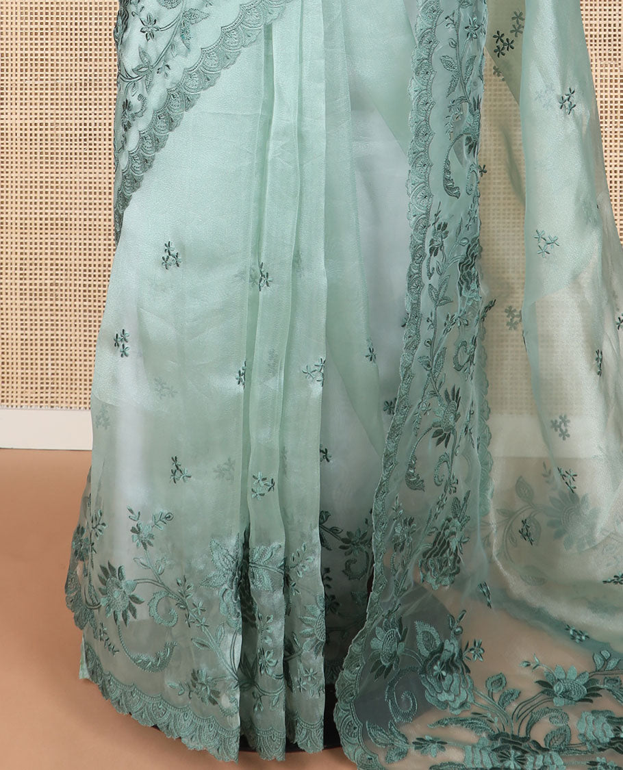 Pista green embroidered tissue organza saree with floral embroidery, scallop border & embroidery pallu along with embroidered blouse