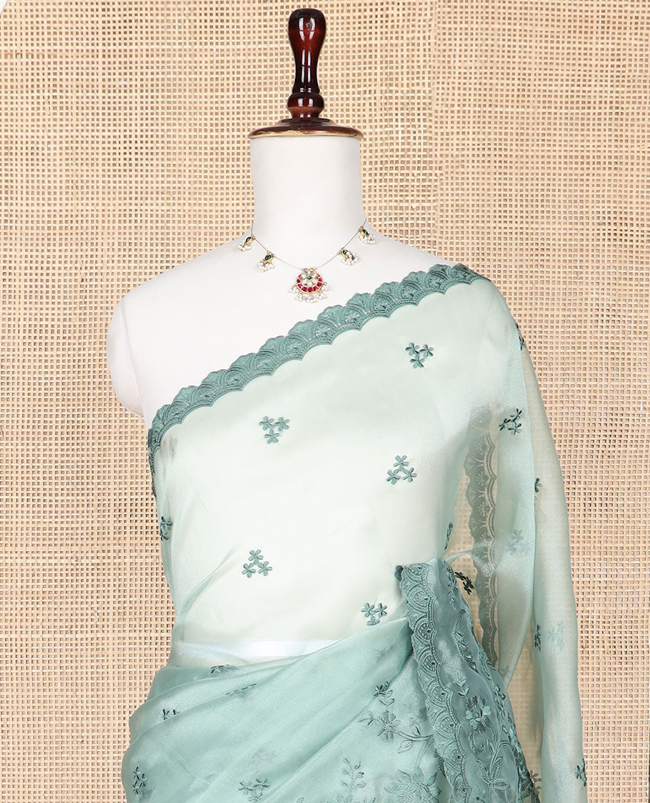 Pista green embroidered tissue organza saree with floral embroidery, scallop border & embroidery pallu along with embroidered blouse