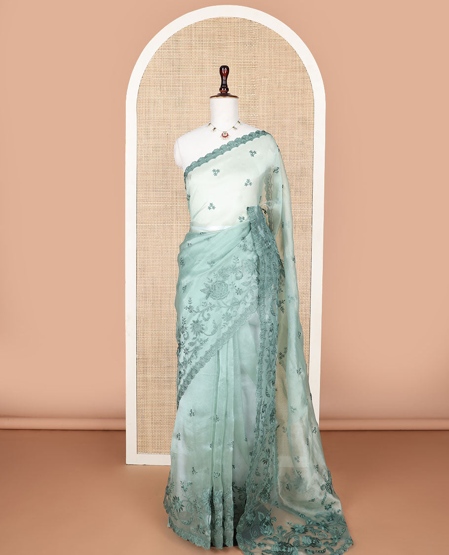 Pista green embroidered tissue organza saree with floral embroidery, scallop border & embroidery pallu along with embroidered blouse
