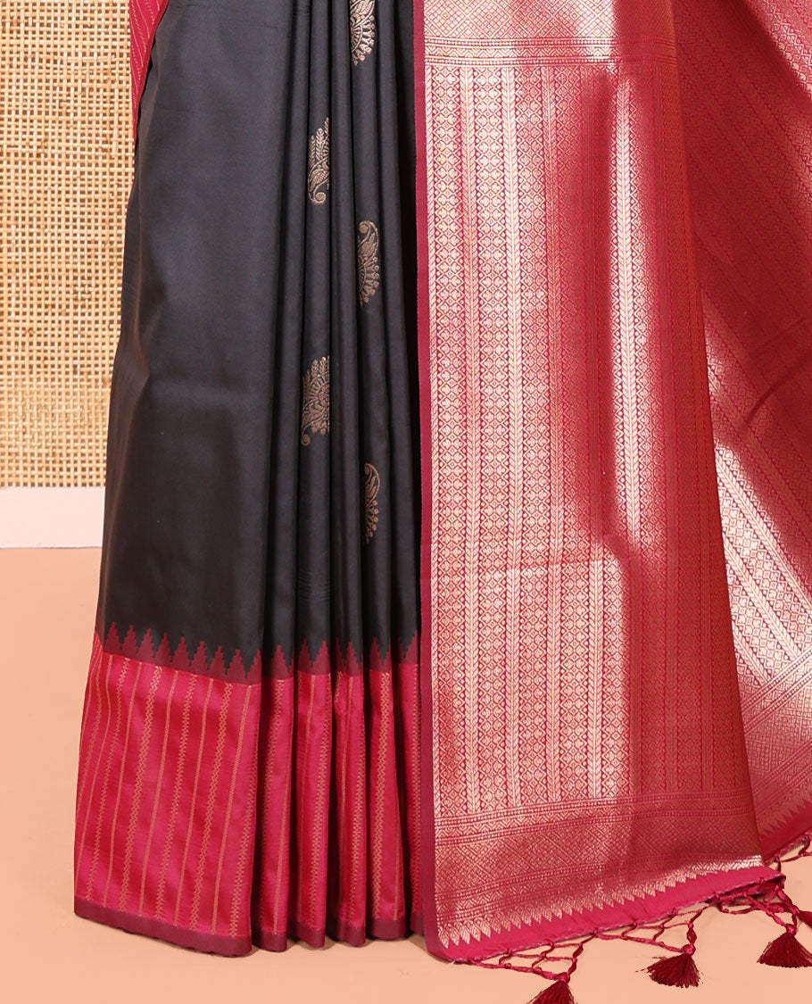 Black Elite Soft Silk Saree, Highlighted by Zari Buttas All Over Its Body, Complemented by Contrast Border Steeped with Geometric Patterns, Grand Pallu, and Paired with a Contrast Blouse