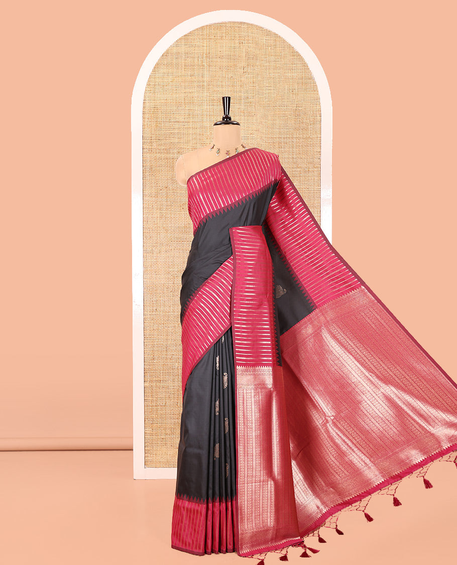 Black Elite Soft Silk Saree, Highlighted by Zari Buttas All Over Its Body, Complemented by Contrast Border Steeped with Geometric Patterns, Grand Pallu, and Paired with a Contrast Blouse