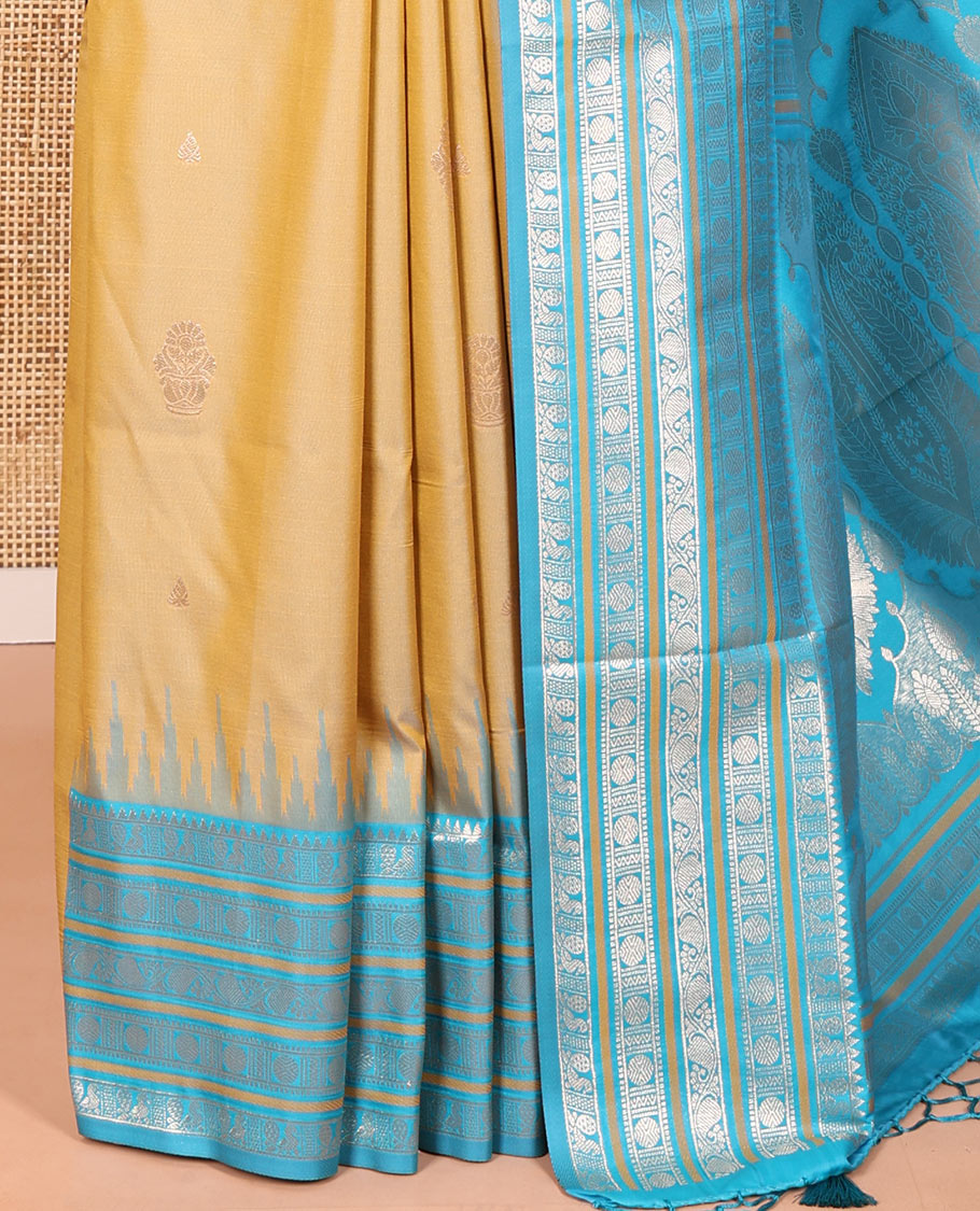 Mehendi Green Elite Soft Silk Saree, Bedecked with Zari Buttas All Over Its Body, Complemented by Contrast Temple Traditional Zari Border of Peacock-Rudraksham Motifs, Intricately Zari Woven Pallu and Paired with a Contrast Blouse