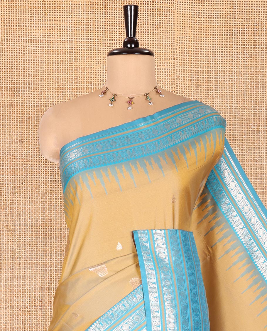 Mehendi Green Elite Soft Silk Saree, Bedecked with Zari Buttas All Over Its Body, Complemented by Contrast Temple Traditional Zari Border of Peacock-Rudraksham Motifs, Intricately Zari Woven Pallu and Paired with a Contrast Blouse