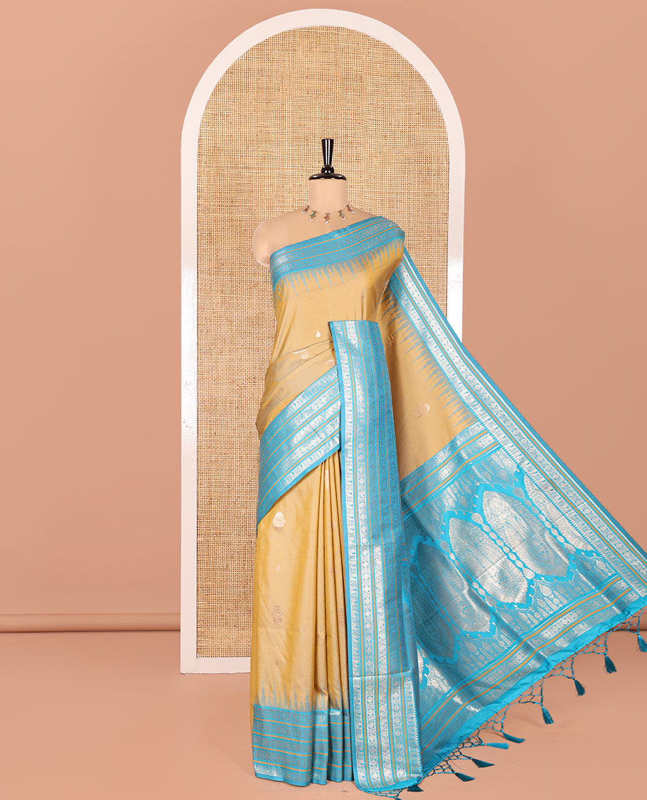 Mehendi Green Elite Soft Silk Saree, Bedecked with Zari Buttas All Over Its Body, Complemented by Contrast Temple Traditional Zari Border of Peacock-Rudraksham Motifs, Intricately Zari Woven Pallu and Paired with a Contrast Blouse