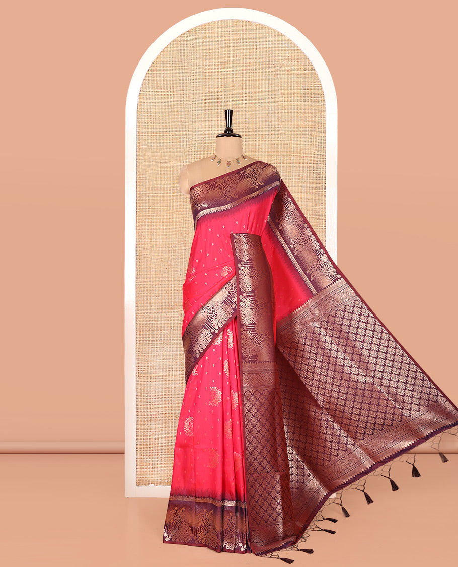 Rani Pink Elite Soft Silk Saree, Enriched with Zari Buttas on Its Body, Complemented by a Contrast Peacock-Floral Zari Blouse, Intricately Designed Pallu, and Paired with a Contrast Blouse