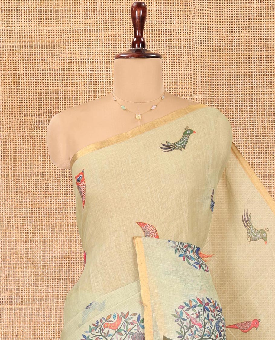 Pista Green Linen Cotton Saree, Steeped in the Richness of Nature-Themed Motifs Like Bird, Owl, and Tree, a Subtle Piping Border, Pallu of Tree Motifs, and Paired with a Matching Blouse